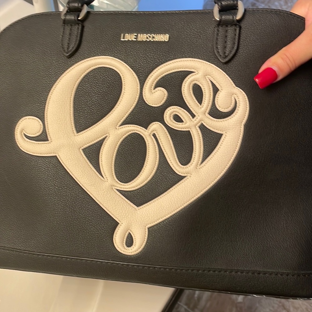 Love moschino bag barely used like new